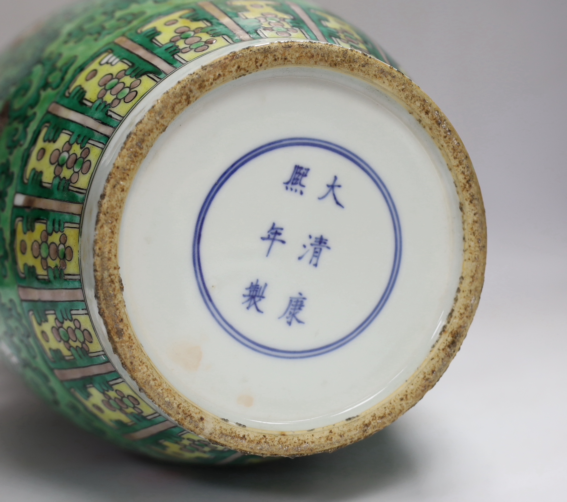 A Chinese green ground enamelled porcelain vase, Kangxi mark but late 19th century, 45cm